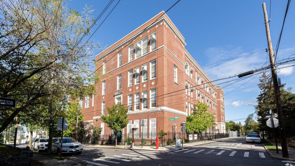 Red brick school construction timeline supported by CPM scheduling analysis.