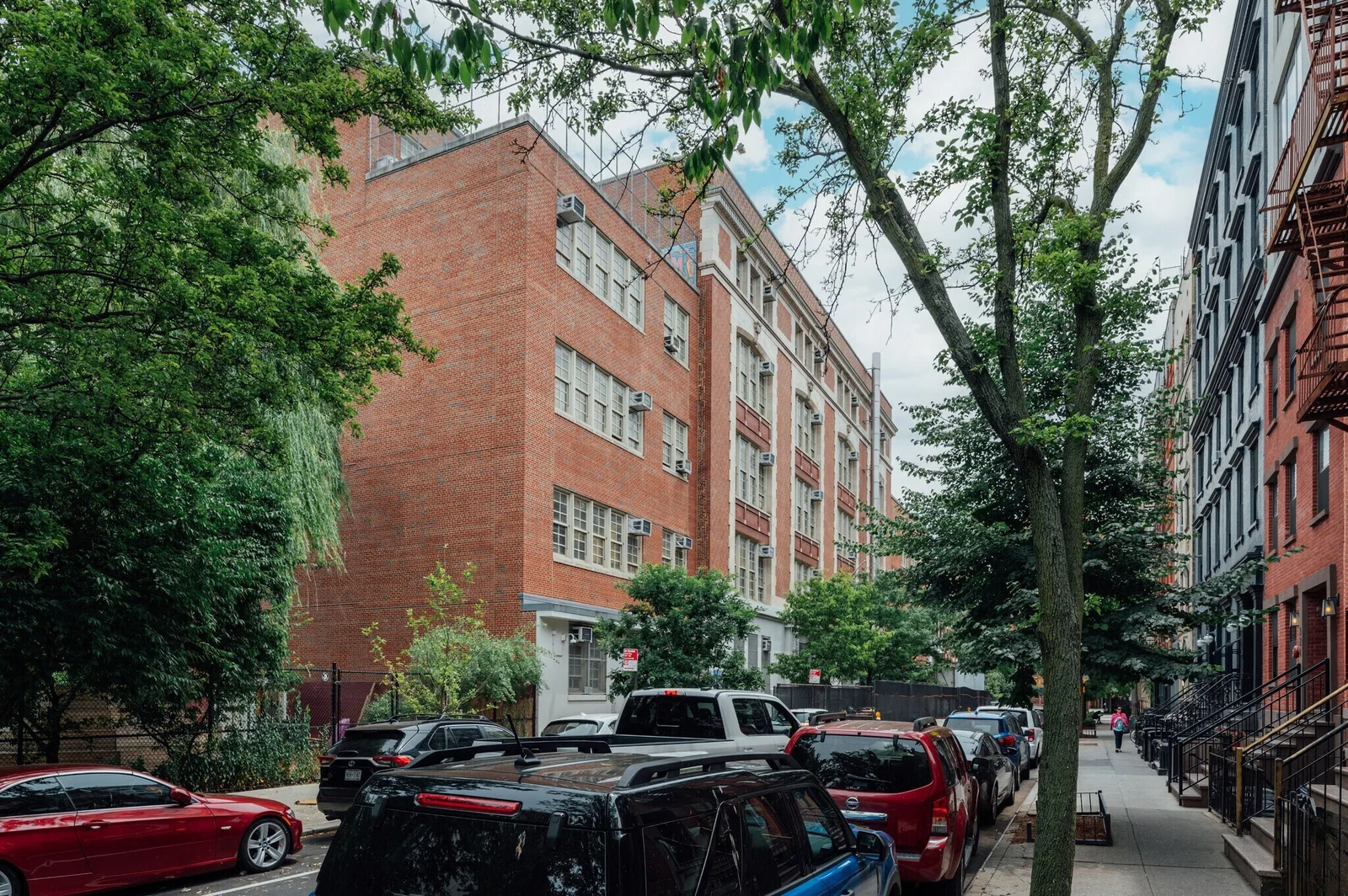 Urban school infrastructure managed under CPM scheduling to avoid construction delays.